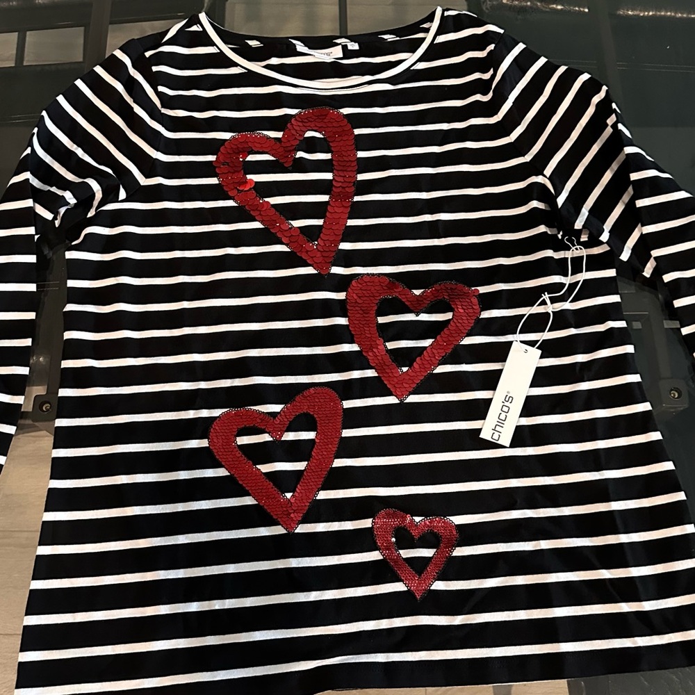 Chico’s size large top, three quarter sleeves, new with tags